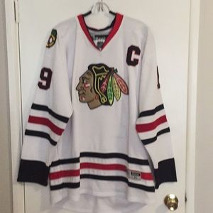 White Blackhawks jersey. #19 Toews size XL